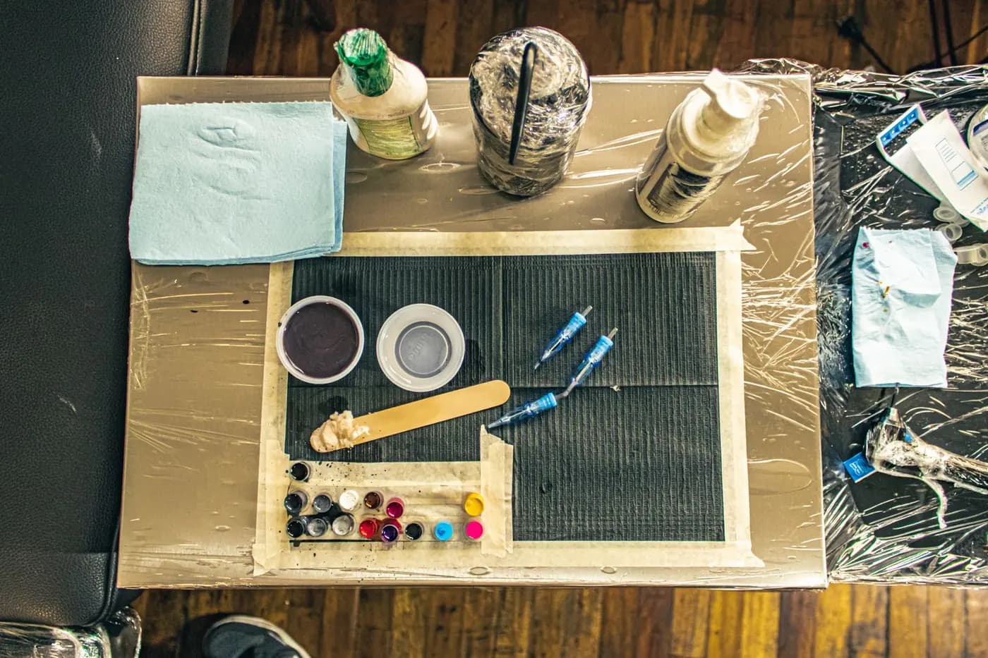 Professional tattoo studio work surface prepared for a session.
